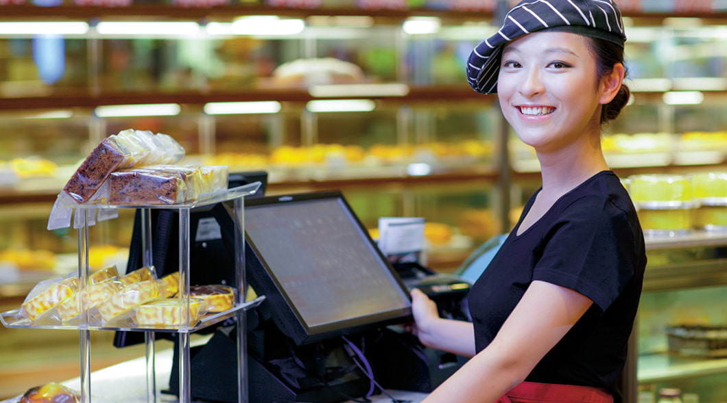 Cashier at a register