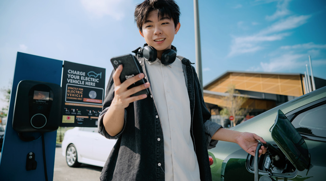 Photo of a person charging their electric car