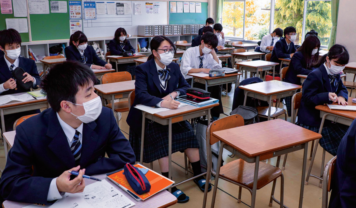 Photo of students sitting at their desks in a classroom