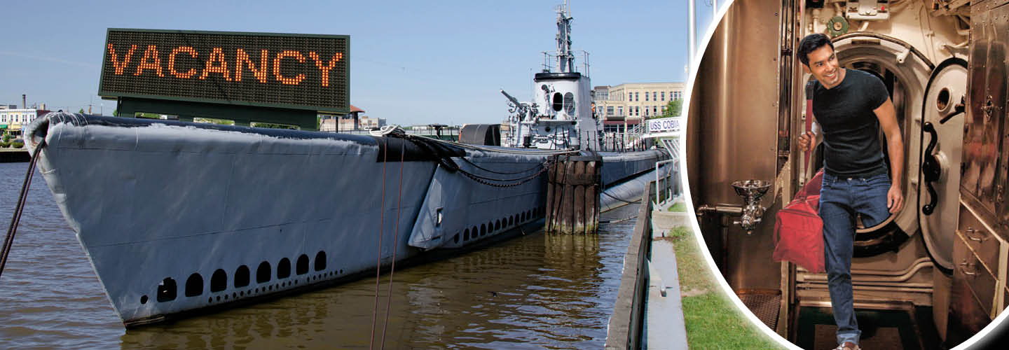 Image of a large submarine advertising 'Vacancy'
